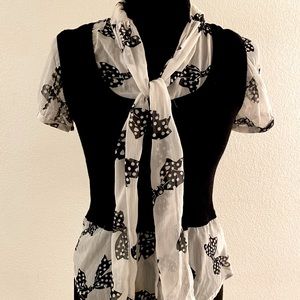 Sheer sweater vest bow top